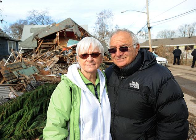 Sheila and Dominic Traina near their home that was destroyed by Superstorm Sandy during the fall. (Photo by The Daily News.)