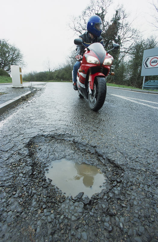 pothole 1 - Deputy's Death A Reminder That Potholes Can Be Killers For Motorcyclists, Says NY and PA Motorcycle Lawyer