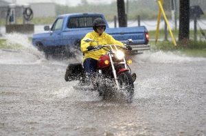 rain cycle 300x199 - Practice To Ride Safely In The Rain, Says NY And PA Motorcycle Law Lawyer