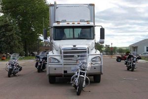 securedownload 300x200 - Watch For Tractor-Trailers, A Big Danger To Motorcyclists, Says NY and PA Motorcycle Lawyer